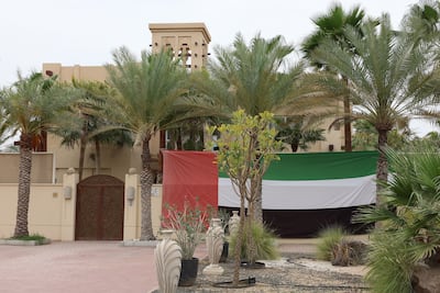 A giant flag on display on a villa in Al Barsha. Flags show national pride in different communities in Dubai. Chris Whiteoak / The National