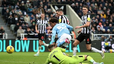 Oscar Bobb scores Manchester City's injury-time winner. Reuters