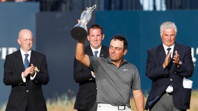 Francesco Molinari lifted the Claret Jug for the first time and was crowned Champion Golfer of the Year. Paul Childs / Reuters