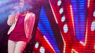 Haina Uddin sings at the Talentadong Pinoy competition. Antonie Robertson / The National