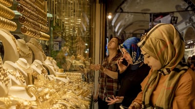 “If there are dollars under your pillow, take these out. If there are euros, take these out .. Immediately give these to the banks and convert to Turkish lira," Mr Erodgan said on Saturday. Ismail Ferdous/Bloomberg