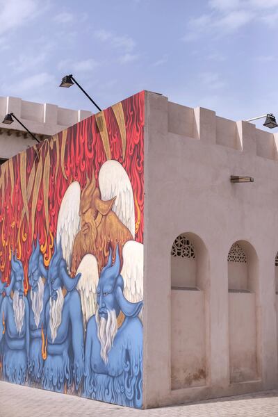 A wall mural showing at Sharjah Biennial 14. Reem Mohammed / The National.