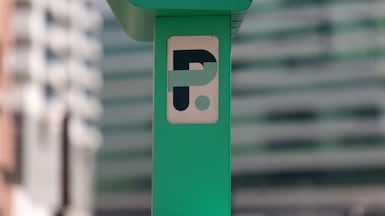 The new paid system - which came into effect on Wednesday - covers on-street, off-street and retail parking at the Aljada megaproject. Chris Whiteoak / The National