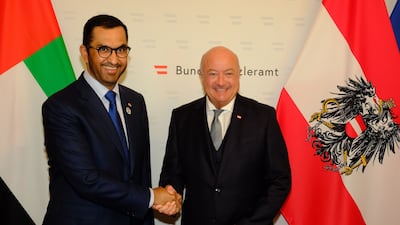 Dr Sultan Al Jaber, Minister of Industry and Advanced Technology, left, with Austrian Chancellor Christian Stocker in Vienna. Wam