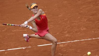 Eugenie Bouchard plays a shot at the French Open on June 3, 2014l. Kenzo Tribouillard / AFP