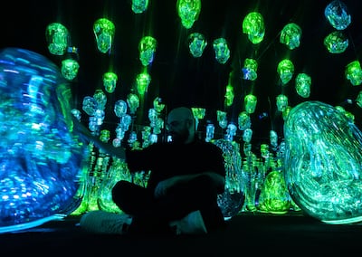 An interactive digital installation at teamLab Phenomena Abu Dhabi. Victor Besa / The National