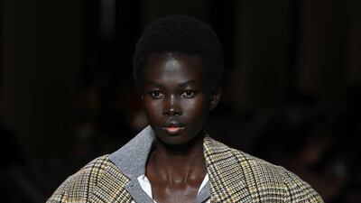 Miu Miu mixed micro skirt and shorts with heavy winter coats. Getty Images