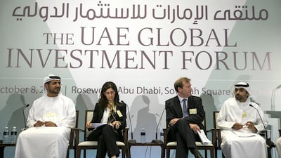Khaled Salmeen Al Kuwairi, the Kizad chief executive, left, Anthony Chamboredon, associate professor at the Paris-Sorbonne University-Abu Dhabi, second right, and Fahad Saeed Al Raqbani, the director general of Abu Dhabi Council for Economic Development, speak at the investment forum. Silvia Razgova / The National