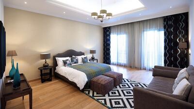 A Bedroom in a four-bedroom Mediterranean villa. Waterfront properties are selling at Dh2,700 per sq ft and others at Dh2,500. Satish Kumar / The National