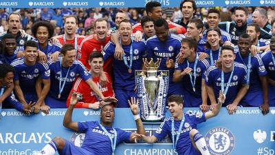 Chelsea players celebrate with the Premier League trophy as officially crowned 2014/15 champions on Sunday. John Sibley / Action Images / Reuters