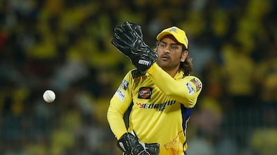 Chennai Super Kings' MS Dhoni fields the ball during the Indian Premier League cricket tournament between between Chennai Super Kings and Gujarat Titans, in Chennai, India, Tuesday, March 26, 2024. (AP Photo/R. Parthibhan)