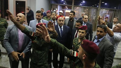 Iraqi Prime Minister designate Adel Abdul Mahdi walks out of the Parliament in Baghdad on October 2, 2018. AFP