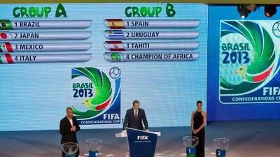 Brazil and Uruguay are in separate groups, as are Spain and Italy, since teams from the same confederation cannot be pooled together. Sebastiao Moreira / EPA