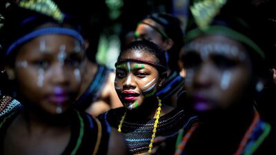 Women in their traditional outfits take part in the Indoni SA Cultural festival in Durban. The Indoni festival, a three-day feast, showcases traditions of South African provinces and aims to demonstrate unity and the unique diversity of the country. Rajesh Jantilal / AFP