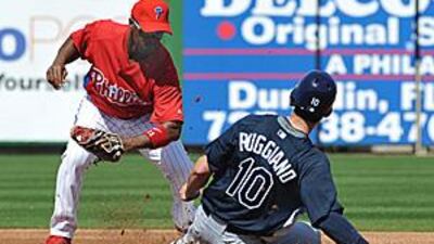 Justin Ruggiano, right, of the Tampa Bay Rays slides into second base ahead of a throw to shortstop Jimmy Rollins of the Philadelphia Phillies during the Phillies 12-5 win.