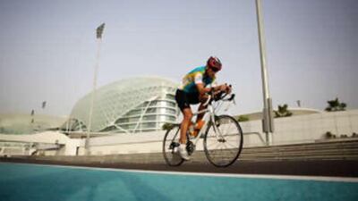 Cyclists ride around the Yas Marina circuit during a June event organised by the group Cycle Safe.