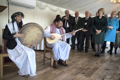 Baroness Nicholson looks on as members of the Yazidi Choir perform at the Houses of Parliament. Stephen Lock for The National