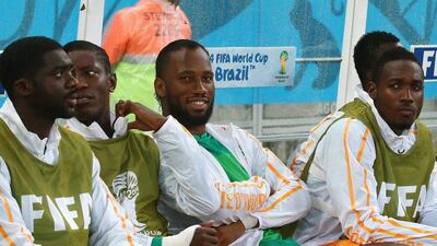 Didier Drogba of the Ivory Coast looks on from the bench during his side's 2014 World Cup Group C match against Japan on Saturday. He came in as a reserve later in the game. Mark Kolbe / Getty Images / June 14, 2014