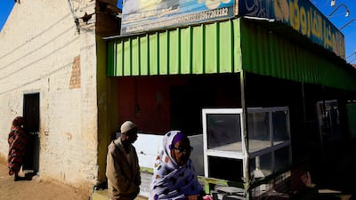 Sudanese people buy bread at a bakery in the town of Atbara, an industrial town 350 kilometres northeast of Sudan’s capital Khartoum. AFP