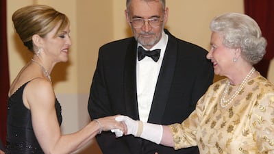 The monarch with pop star Madonna at London's Albert Hall. WireImage