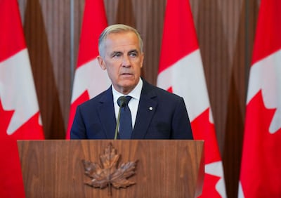 Canada’s Prime Minister Mark Carney speaks to reporters in Ottawa, Ontario after he suspended trade negotiations with the US. Reuters