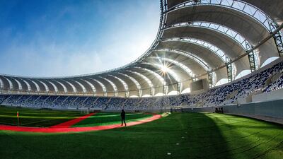 Finishing touches are made to the stadium ahead of a friendly match between Iraqi's Al-Minaa and Kuwait SC.
