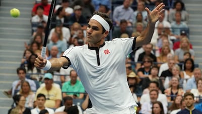 Roger Federer returns a shot against Damir Dzumhur. AFP