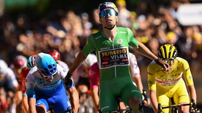 Jumbo-Visma's Belgian rider Wout Van Aert celebrates winning Stage 8. AFP
