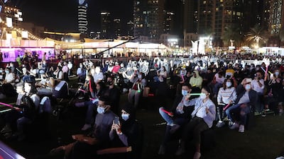 Concert-goers will still need to remain 2 metres apart under the new regulations. Pawan Singh / The National