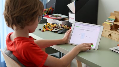 A young learner takes part in Arabic studies online in Dubai. Chris Whiteoak / The National