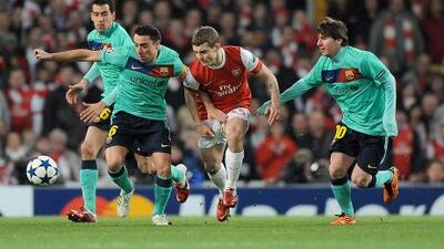 Jack Wilshere, centre, more than held his own for Arsenal against Barcelona's stars.