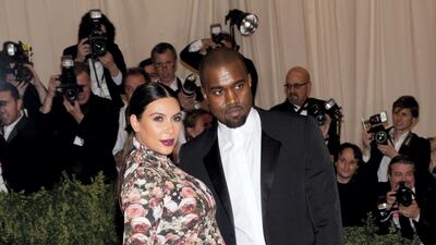 Kanye West and Kim Kardashian in Givenchy at the 2013 Met Gala. Getty Images