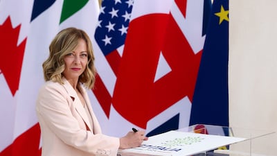 Ms Meloni arrives on the first day of the G7 summit. Reuters