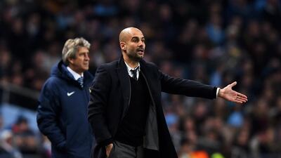 Manager Pep Guardiola, right, who is now in charge at Manchester City, will meet his former club Bayern Munich in a pre-season friendly next month. Laurence Griffiths / Getty Images