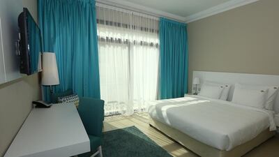 Light pours into a ready-furnished bedroom. Courtesy Chestertons