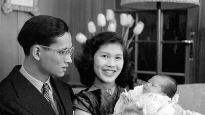 Thai King Bhumibol Adulyadej and Queen Sirikit posing with their first child Princess Ubol Ratana in April 1951. AFP