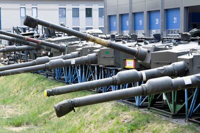 Tank gun barrels and towers for Leopard tanks are pictured at a Rheinmetall production line. Reuters