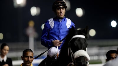 Jockey Christophe Soumillon riding Mujaarib wins the Race 5 Al Rashidiya at the Meydan Racecourse in Dubai on January 30, 2014. Satish Kumar / The National