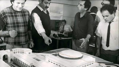 Dimitar Bogdanov (third man standing from the left) discusses the model of the Hamma Center, Algiers (Algeria), Private archive of Borislav Bogdanov, Sofia (Bulgaria).