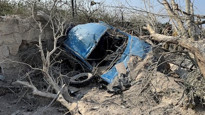 A damaged car after Israeli air strikes in Abbasiyyeh, Tyre district. Reuters