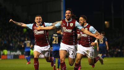 Burnley’s George Boyd celebrates with teammates after scoring the lone goal in a Premier League win over Manchester City at Turf Moor on Saturday. Alex Livesey / Getty Images