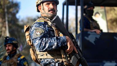 Members of the Iraqi security forces stand guard in the streets of the capital Baghdad. Additional forces will be stationed during Ramadan. AFP