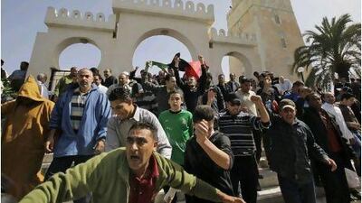 Protesters pour out of Muradagha mosque in Tripoli to demonstrateagainst Muammar Qaddafi after Friday prayers in the Tajoura district of the Libyan capital.