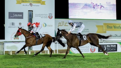 RB Money to Burn under Pat Cosgrave found a way to beat Hakeemat Muscat and jockey Szczepan Mazur on Sunday. Victor Besa / The National
