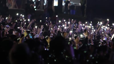 Crowd enjoying the Redfest DXB held at Dubai Media City Amphitheatre in Dubai. Pawan Singh / The National