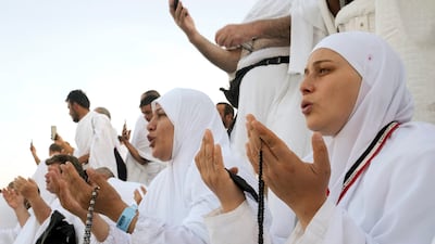 Pilgrims pray on top of Mount Arafat, near Makkah, in Saudi Arabia, during Hajj. AP