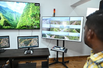 A staff member tracking live feed at Madukkarai forest range in India’s southern Tamil Nadu state. The technical staff at the control room receives notification of the presence of elephants and further share the information with railway authorities and train drivers who slow down the train while frontline staff of the forest department guide the animals away from the tracks averting accidents. Photo: Coimbatore Forest Department