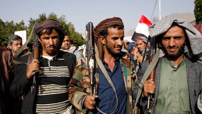 Houthis take part in a protest in Sanaa to mark the seventh anniversary of the Saudi-led military coalition in Yemen. The leadership of the Iran-backed rebel group refuses to participate in a ceasefire called by Saudi Arabia. EPA
