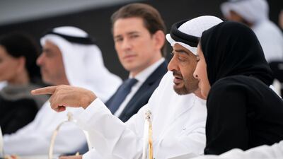 Sheikh Mohamed pictured with Sheikha Hassa bint Mohamed bin Zayed, watching the White Ballet, a classical dressage. Ryan Carter / Ministry of Presidential Affairs