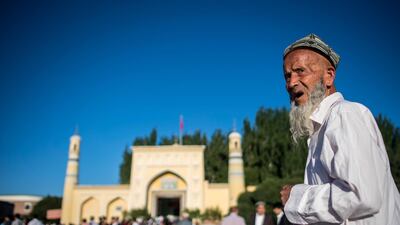 A Muslim man arriving in front of the Id Kah Mosque for the morning prayer on Eid al-Fitr in the old town of Kashgar in China's Xinjiang Uighur Autonomus Region. AFP